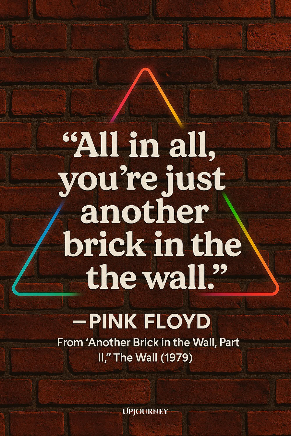 Dark red brick wall background with a colorful neon triangular outline framing a famous Pink Floyd lyric in bold cream text: "All in all, you’re just another brick in the wall." The quote is from Pink Floyd’s 1979 song "Another Brick in the Wall, Part II," from the album "The Wall."